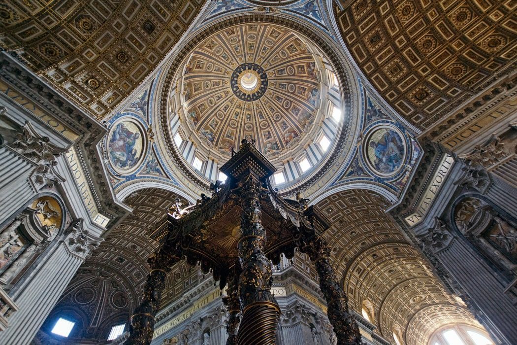 Interior of St. Peter's Basilica with view up to the dome