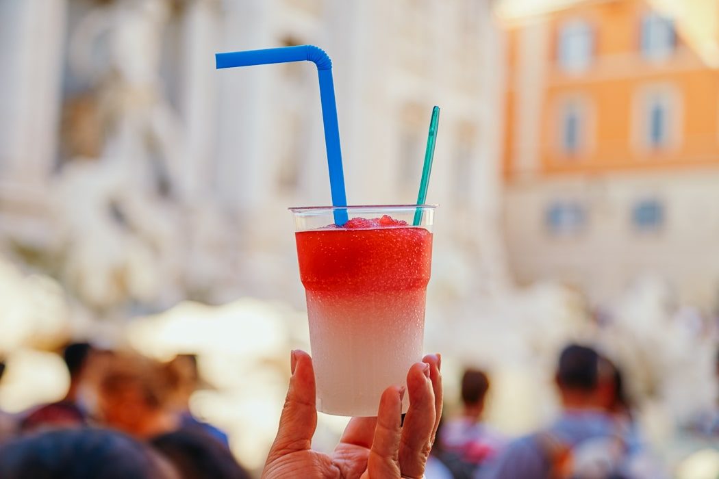 Cup filled with scraped ice and syrup, it is called Grattachecca and is very popular in Rome in summer